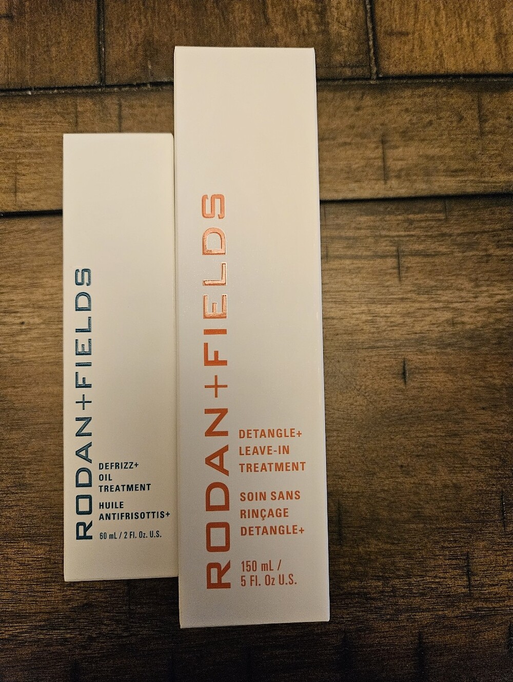 Rodan + Fields White Box with Orange and Teal Text